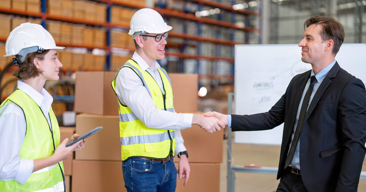 Group of workers working in warehouse